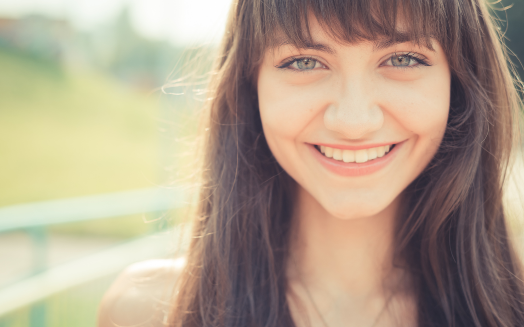 Woman smiling - Totality Healing