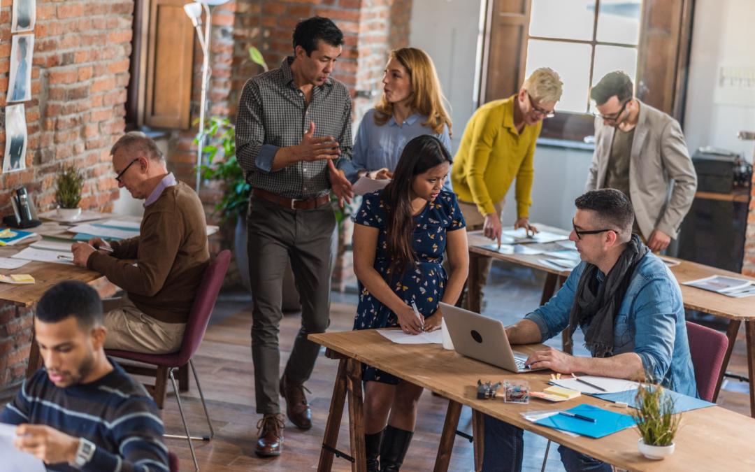 People at work in office - Totality Healing